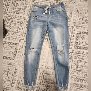 Women's Distressed Light Blue Jeans